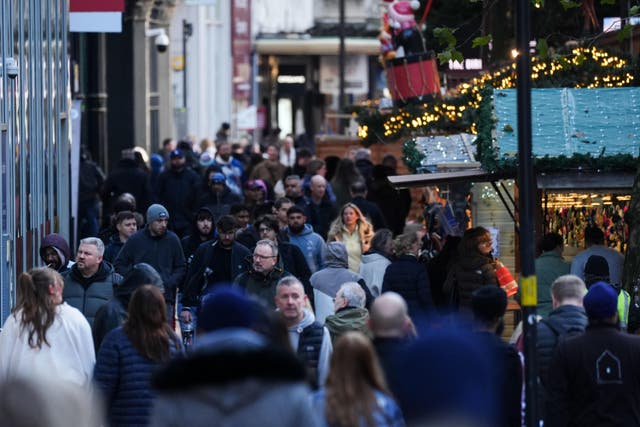 Shoppers on New Street in Birmingham city centre ahead of the festive season (Jacob King/PA)