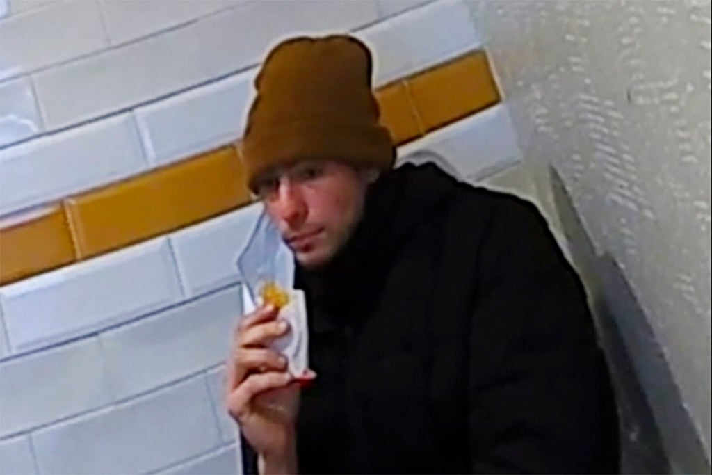 This image, taken from video released by state police, shows Luigi Mangione, a suspect in the fatal shooting of UnitedHealthcare CEO Brian Thompson, at a McDonald’s in Altoona, Pennsylvania