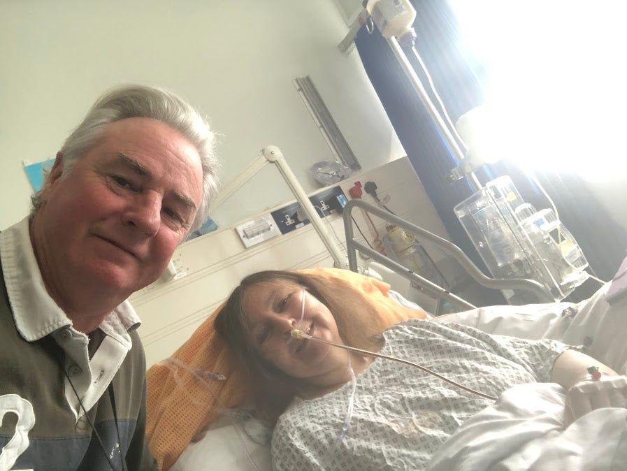 <p>Heulwen Wyatt, one day after her operation, with her husband Rob</p>