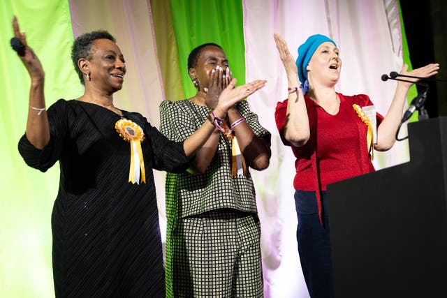 <p>Nnena Kalu (centre) is announced as the winner of the Turner Prize 2025 (James Speakman/PA)</p>