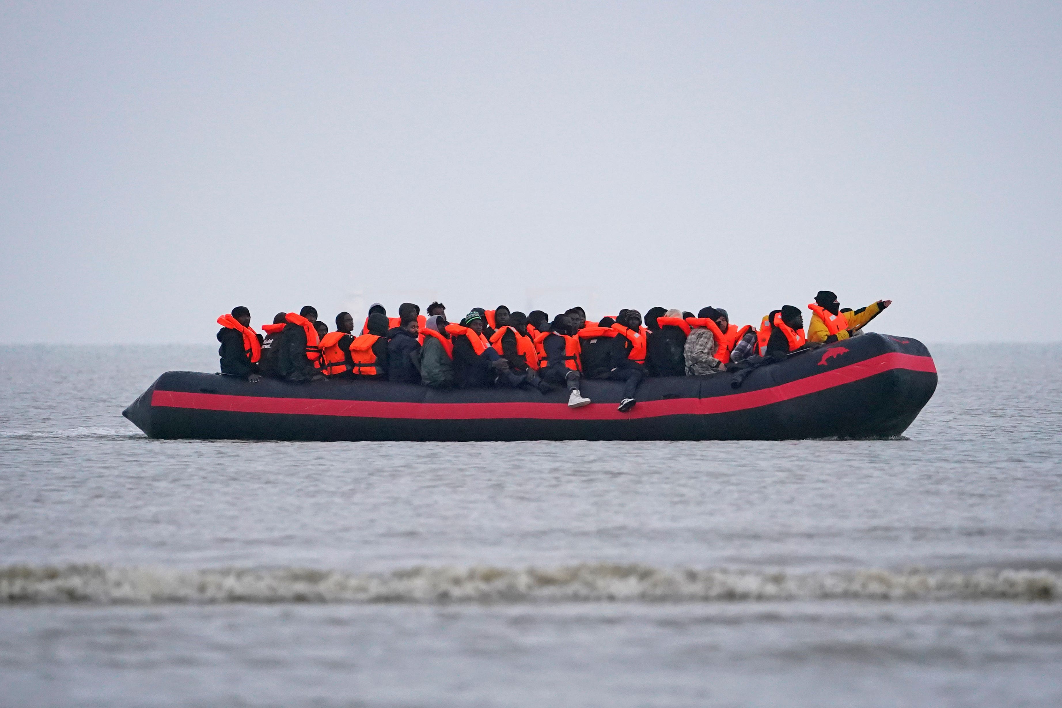 People thought to be migrants onboard a small boat in Gravelines, France (Gareth Fuller/PA)