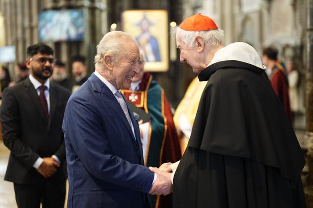 Charles spoke to Cardinal Timothy Radcliffe (Aaron Chown/PA)