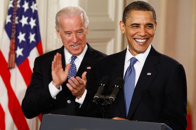 <p>Obama and Biden smile and applaud during the signing ceremony for the Affordable Health Care for America Act in the East Room of the White House March 23, 2010 in Washington, DC</p>