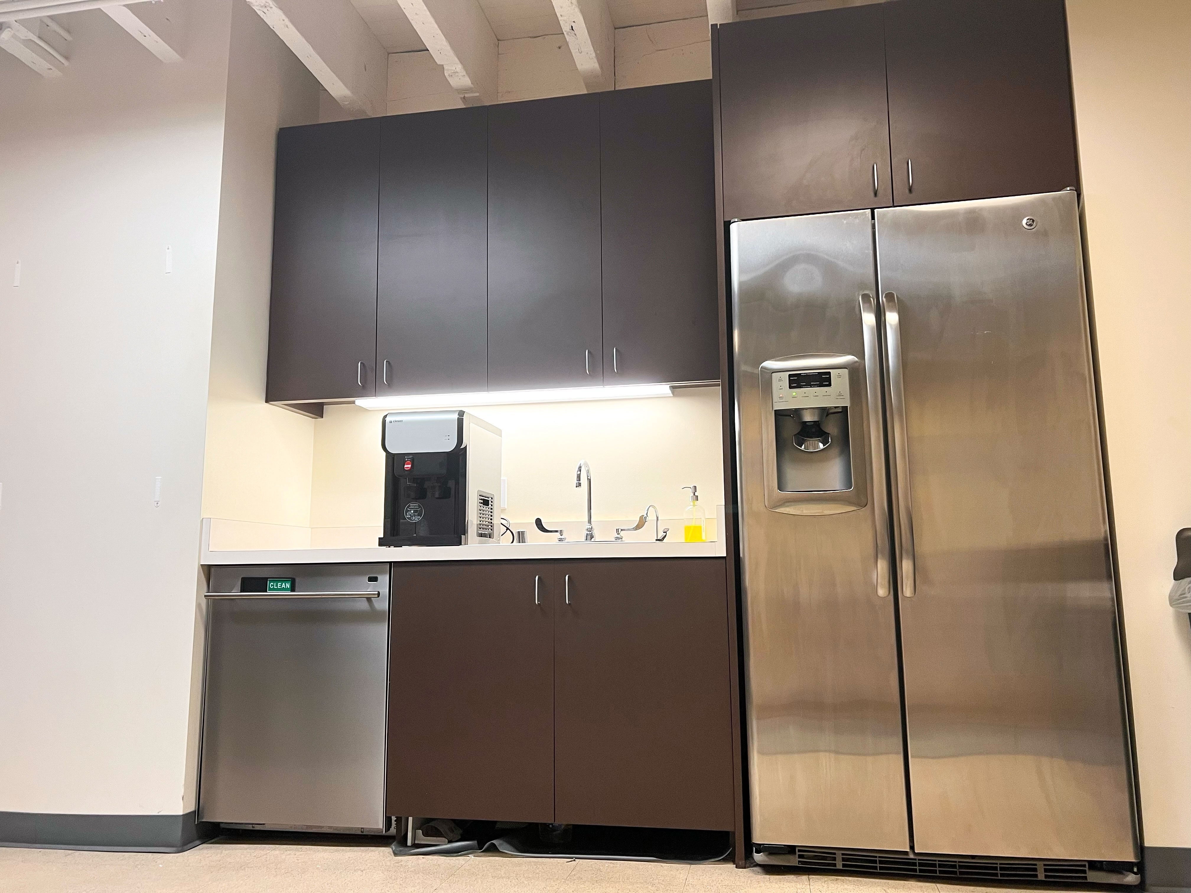 Initially the kitchens at 12 Mint Plaza just had countertop appliances such as microwaves and toaster ovens, but the company is now working to comply with a city law that requires full stoves