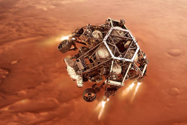 <p>A concept illustration of Nasa's Perseverance rover on its descent to the Martian surface</p>