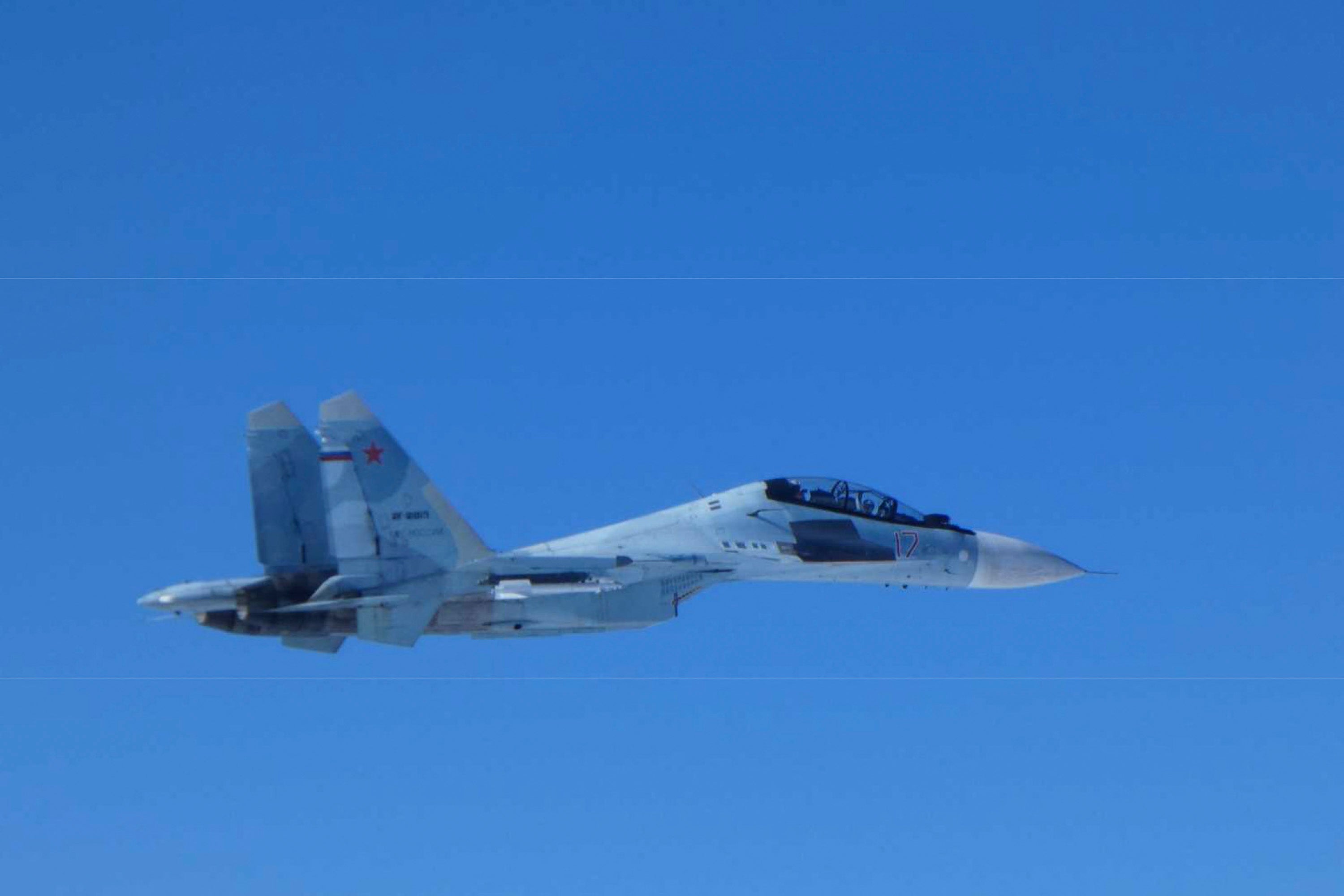 File: Japan's Ministry of Defense shows a Russian Su-30 fighter jet flying over the sea near Japan. South Korea and Japan reacted furiously on December 10 after Chinese and Russian military aircraft conducted joint patrols around the two countries, with both Seoul and Tokyo scrambling jets. (Japan's Ministry of Defense)