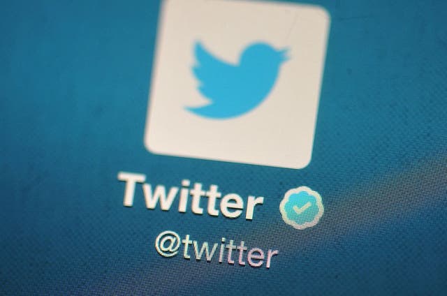 <p>The Twitter logo is displayed on a mobile device on 7 November, 2013 in London, England</p>