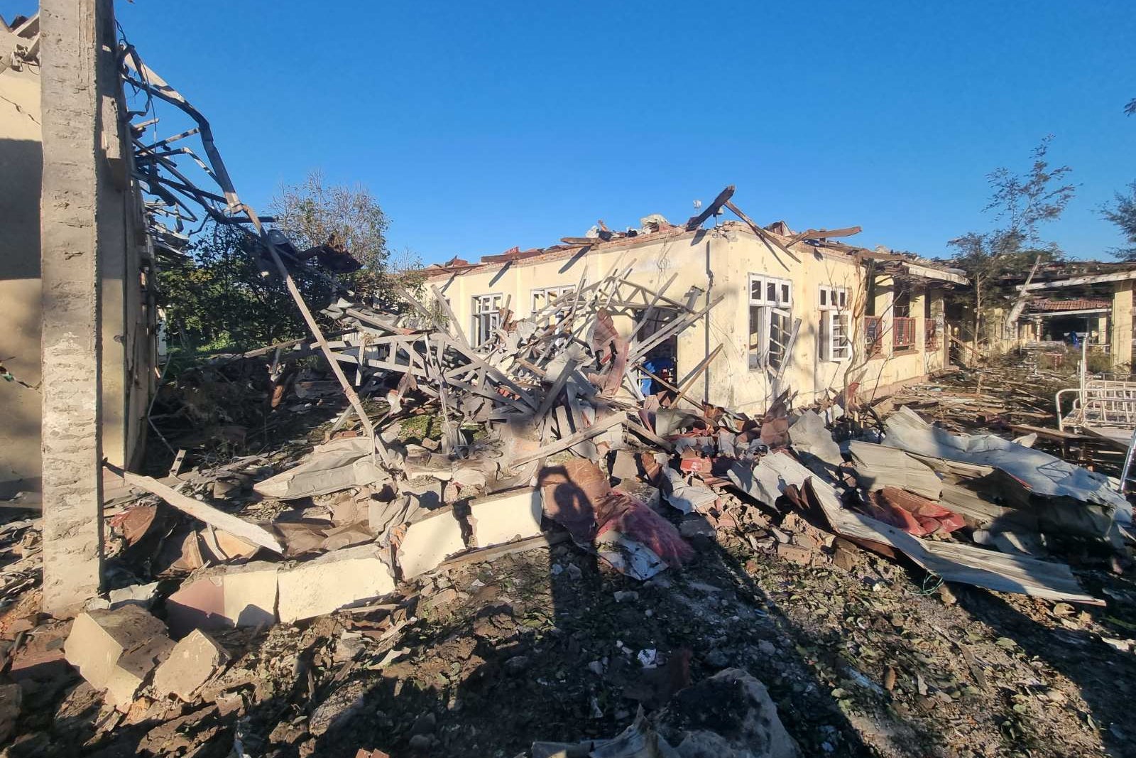 In this photo provided by Wai Hun Aung, a damaged building is seen at the hospital that was allegedly hit by a military air strike in Mrauk-U township in Rakhine state, Myanmar