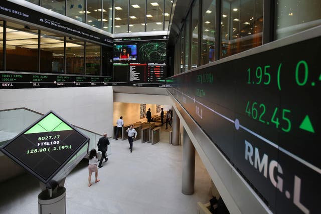 The FTSE 100 index closed up 47.63 points at 9,703.16 (PA)