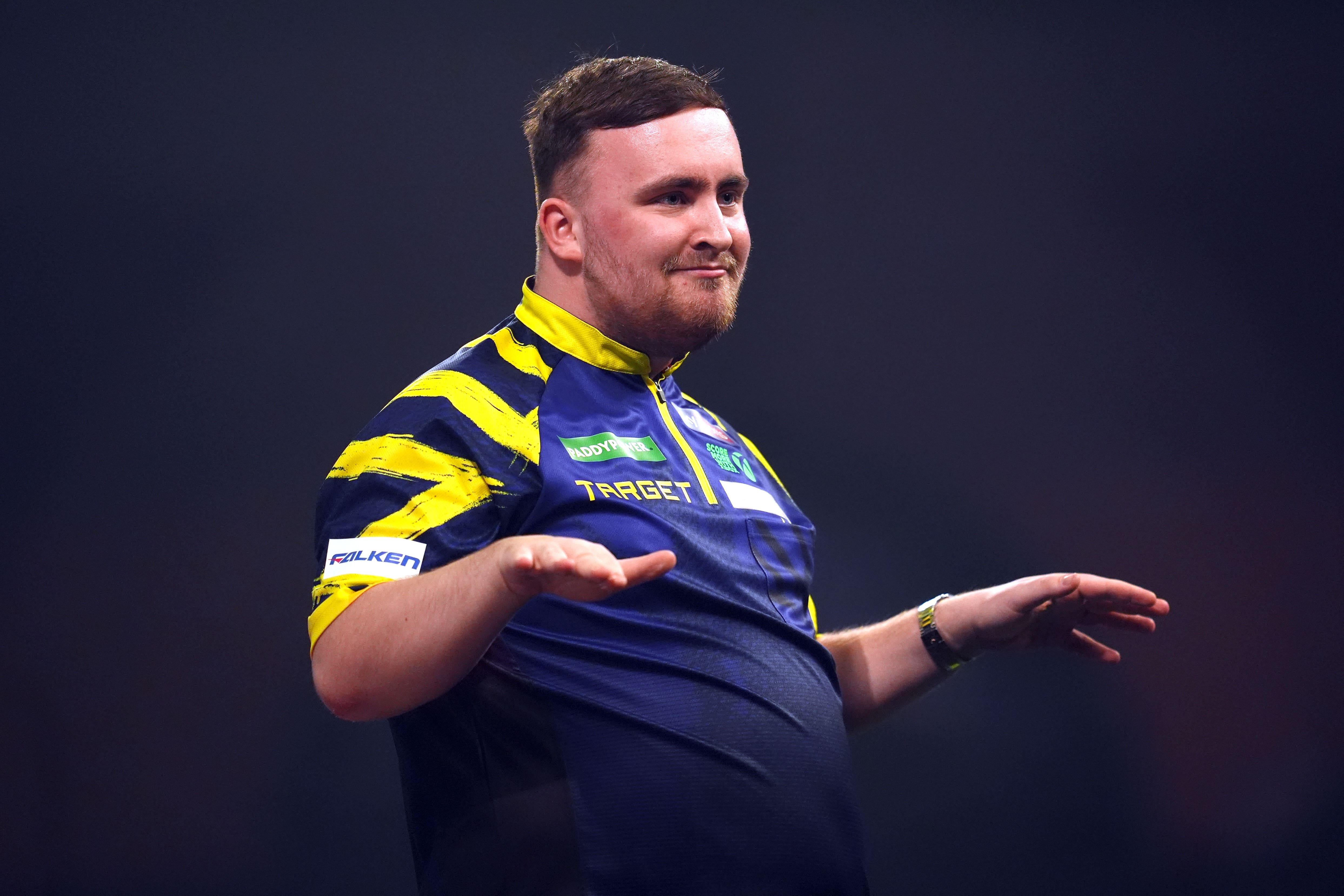 Luke Littler began the defence of his World Championship crown in style (Adam Davy/PA)