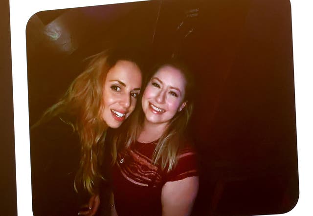 <p>A snapshot of Alissa Kirby, right, a friend of murder victim Ana Walshe, at left, is shown on a monitor during Brian Walshe's murder trial, Wednesday, Dec. 10, 2025, in Dedham, Mass. (Mark Stockwell/The Boston Herald via AP, Pool)</p>