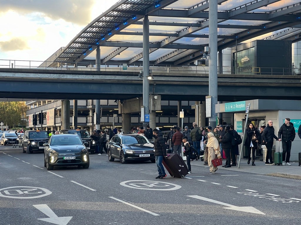 Pay up: Forecourt at London Gatwick airport North Terminal, where motorists will soon have to pay £10 to drop off passengers