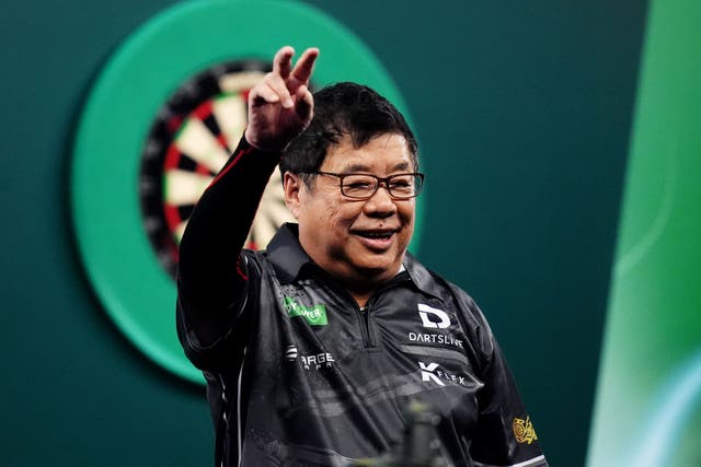 Paul Lim make World Darts Championship history (John Walton/PA)