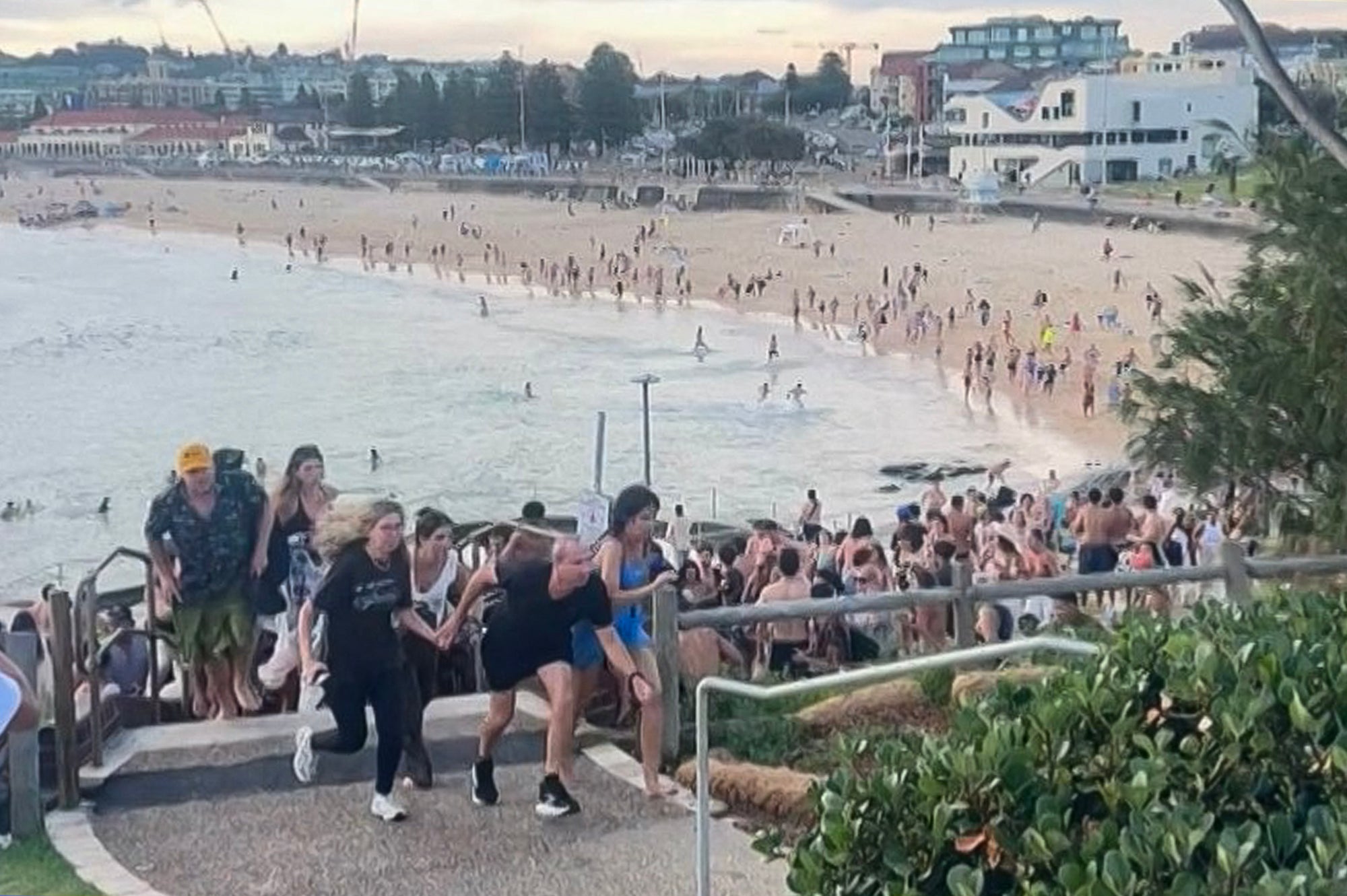 Beachgoers fled after hearing the ‘pop pop’ of gunfire