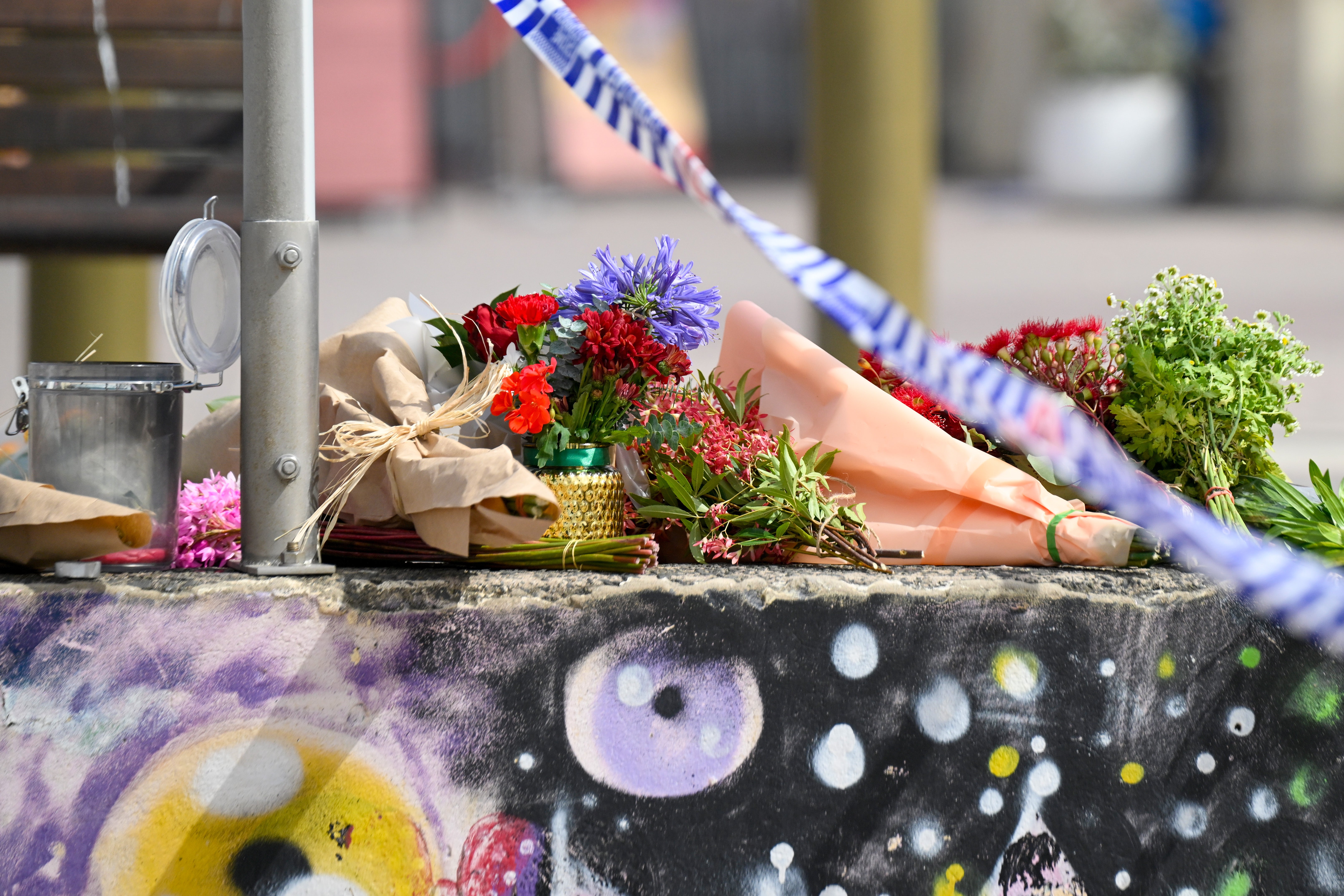 Flowers lay in front of Bondi Pavilion at Bondi Beach on 15 December 2025 in Sydney, Australia