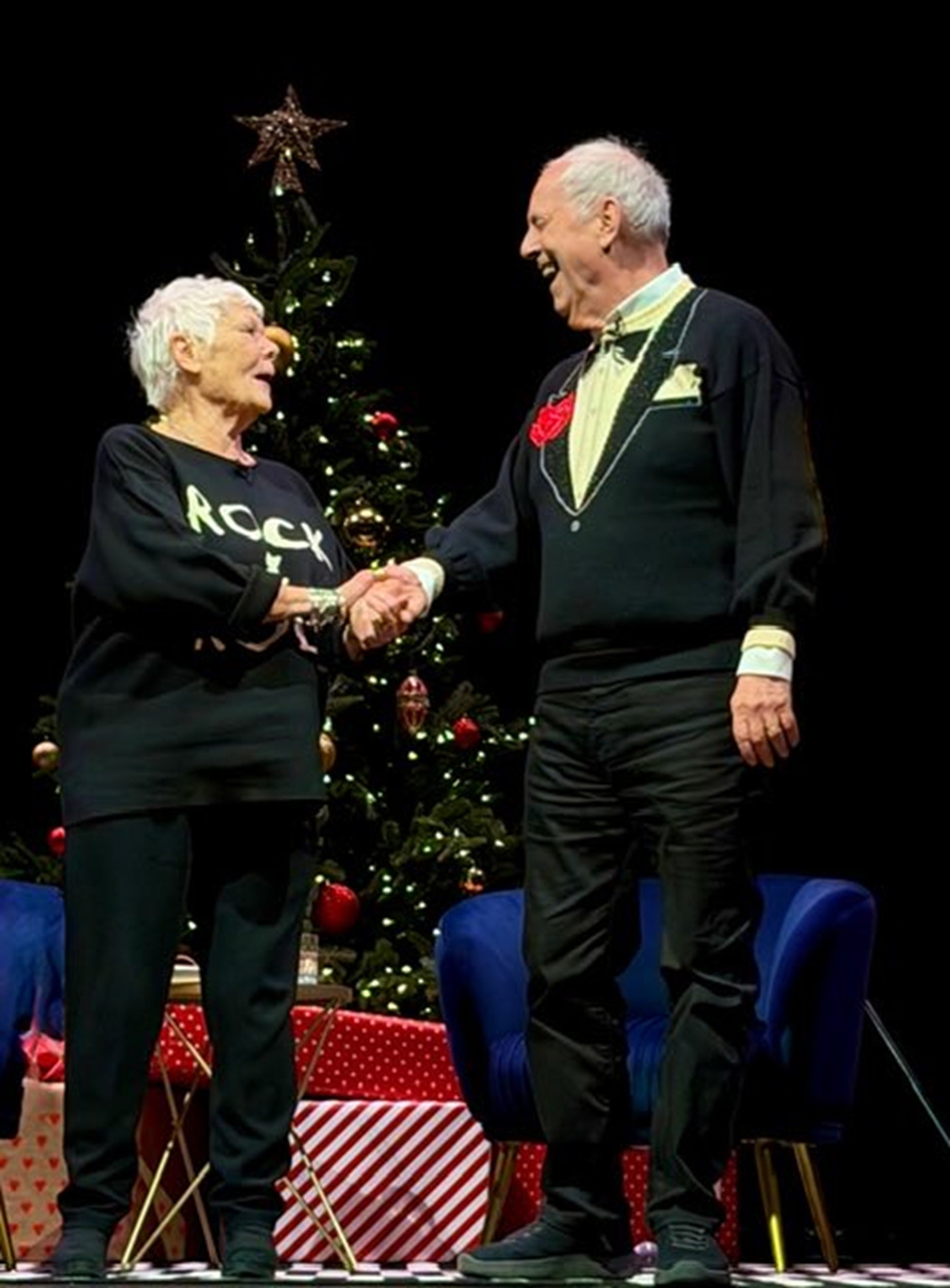 Dame Judi Dench on stage with Gyles Brandreth