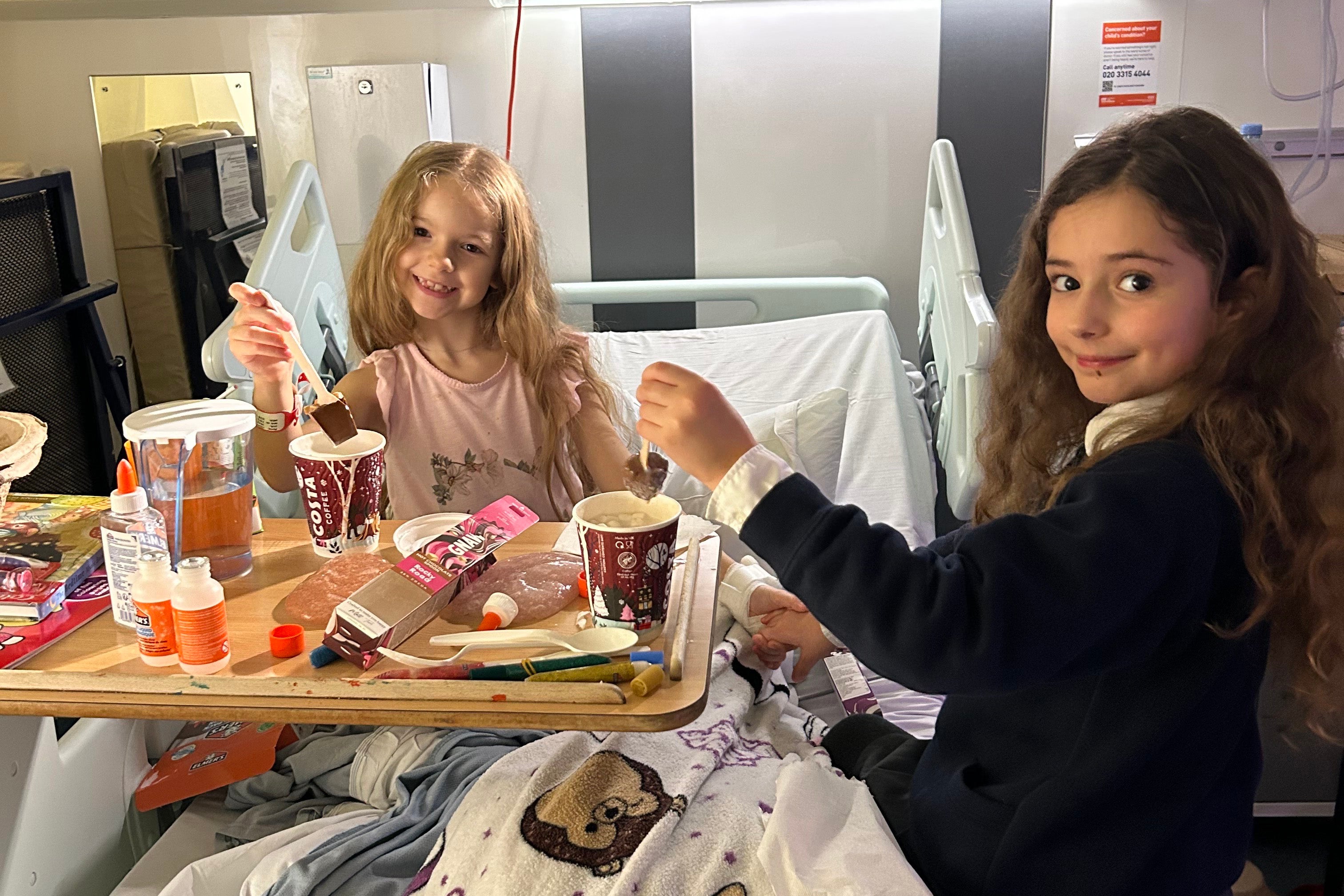 Liberty drinking hot chocolate with her bestie