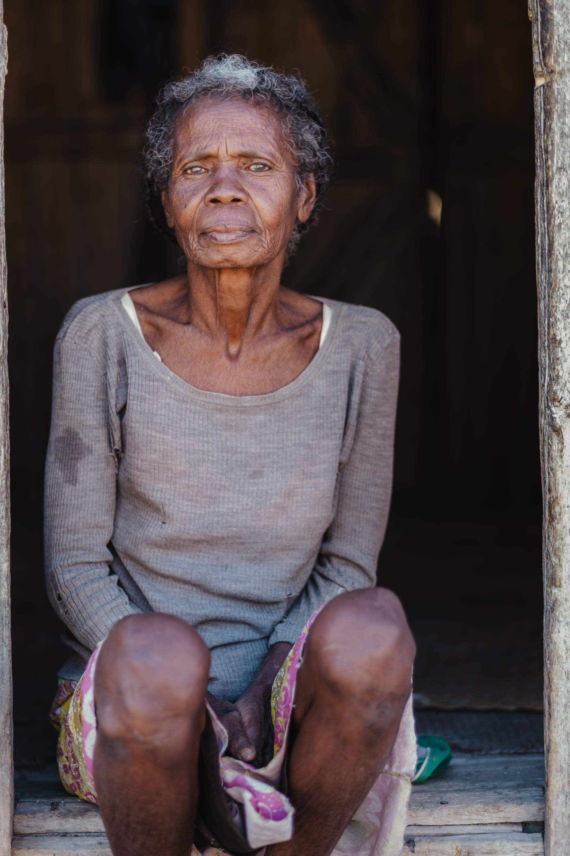 Grandmother Tsalova, 70, currently spends a lot of her time collecting dirty water directly from the Taranty River to drink