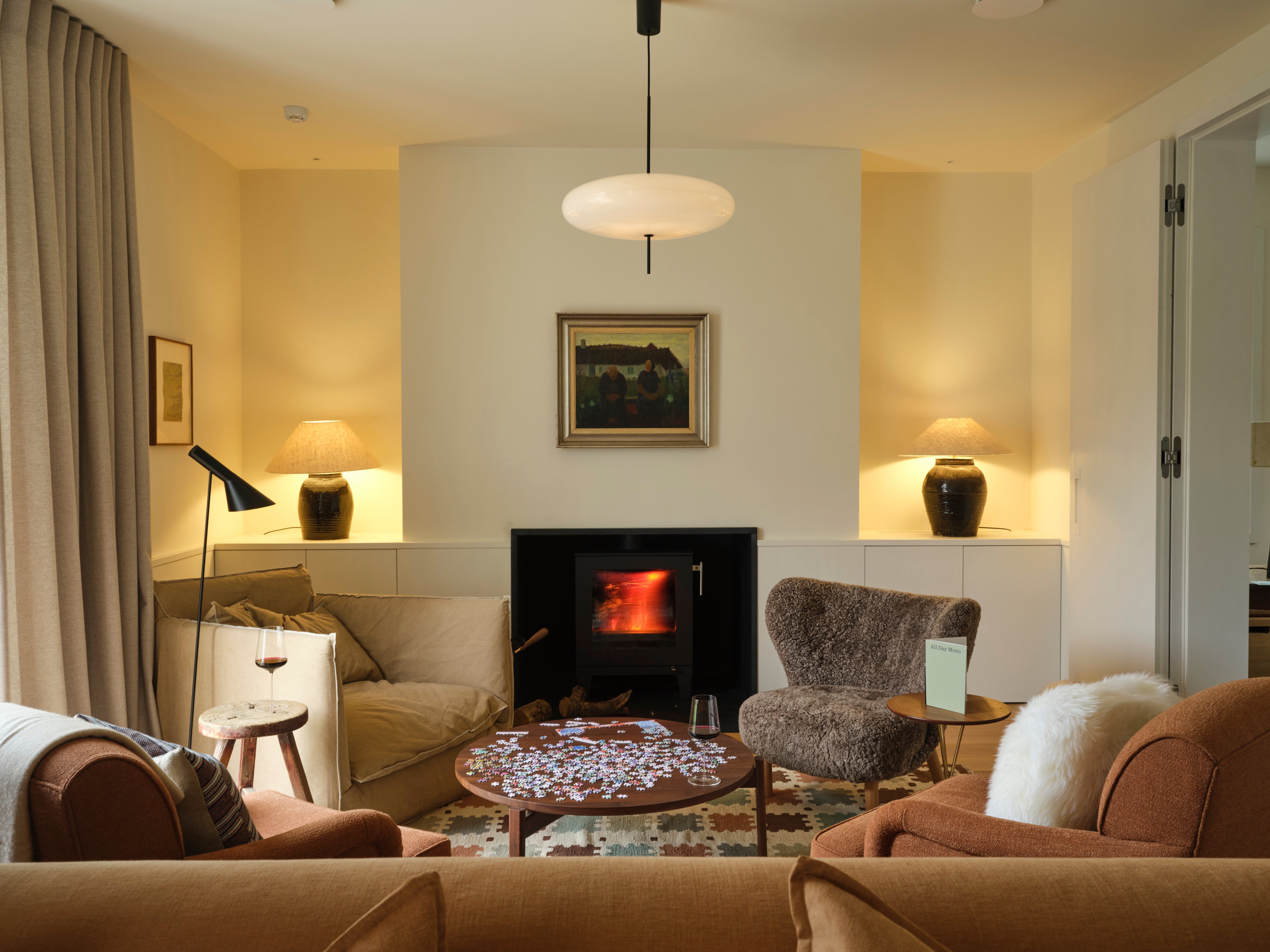 Cosy up by the fire at this chic escape in Devon