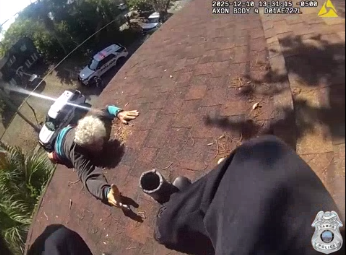 <p>Elderly man dangling from roof saved by police</p>