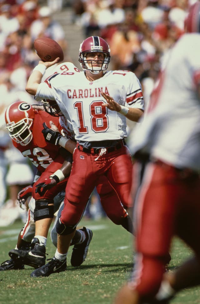 <p>Steve Taneyhill, quarterback for the University of South Carolina Gamecocks, throws a pass downfield during the NCAA Southeastern Conference college football game against the University of Georgia Bulldogs in September 1995 at the Sanford Stadium in Athens, Georgia, United States. The Georgia Bulldogs won the game 42-23</p>