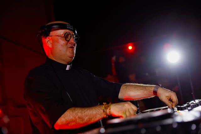 <p>Catholic priest Father Guilherme Peixoto performs on a turntable in Monterrey, Mexico</p>