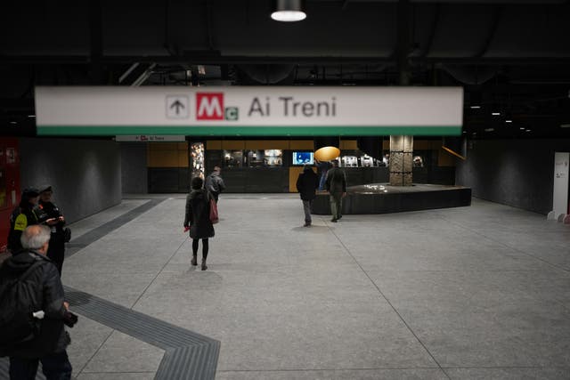 <p>People walk in the hall of the 'Colosseo' new subway station in Rome, Tuesday, Dec. 16, 2025</p>
