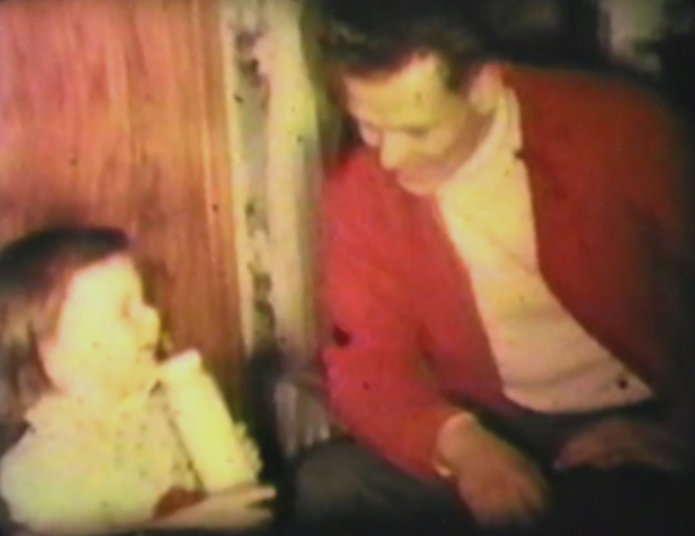 <p>George Carroll pictured with one of his children. For years, his children believed their father, a Korean War veteran, had left them behind </p>