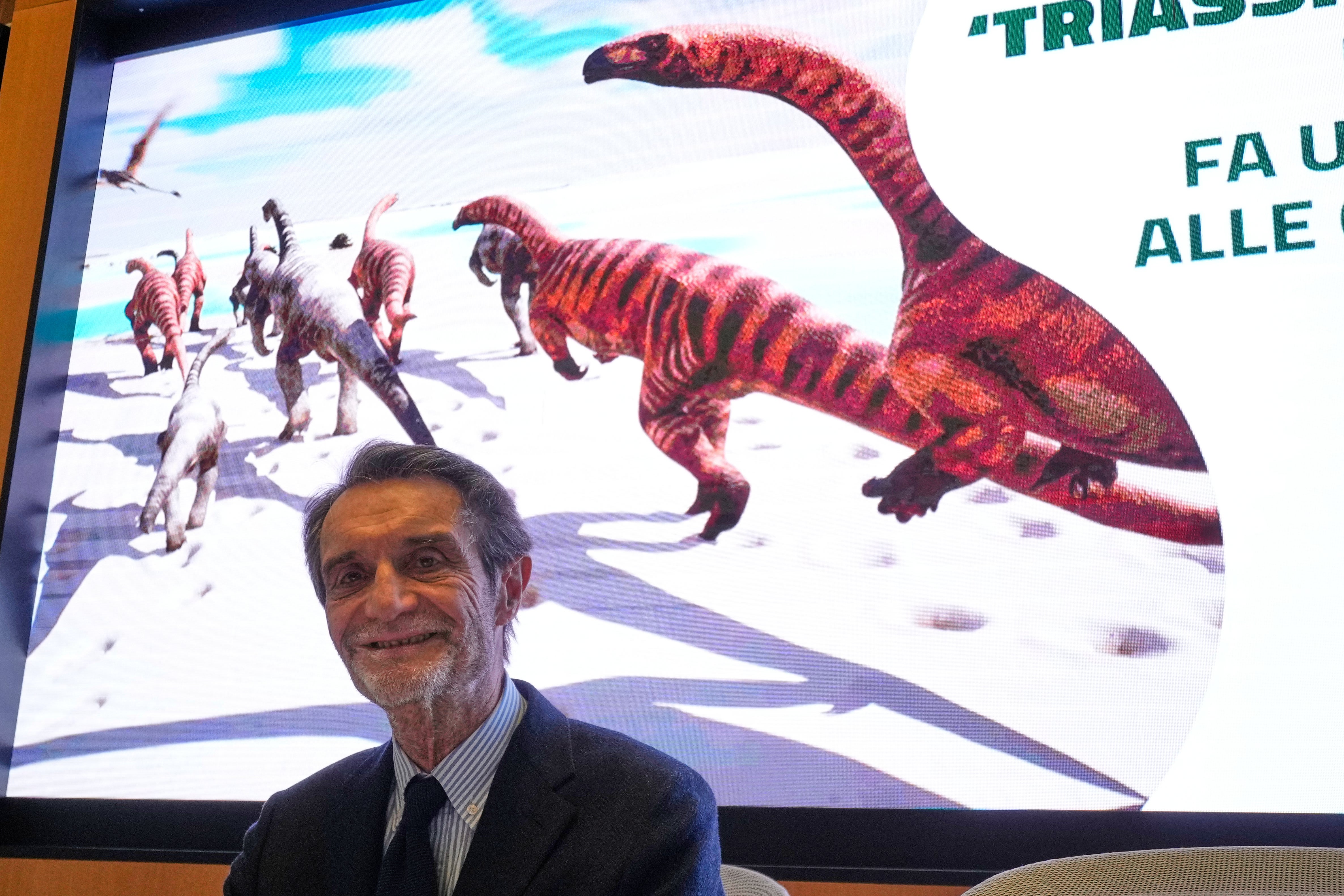 Lombardy Region president Attilio Fontana attends a press conference in Milan, Italy, Tuesday, Dec. 16, 2025, on a discovery of thousands of dinosaur tracks in Lombardy region