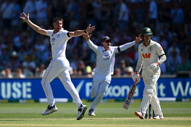 <p>Josh Tongue, left, appeals for the wicket of Alex Carey</p>