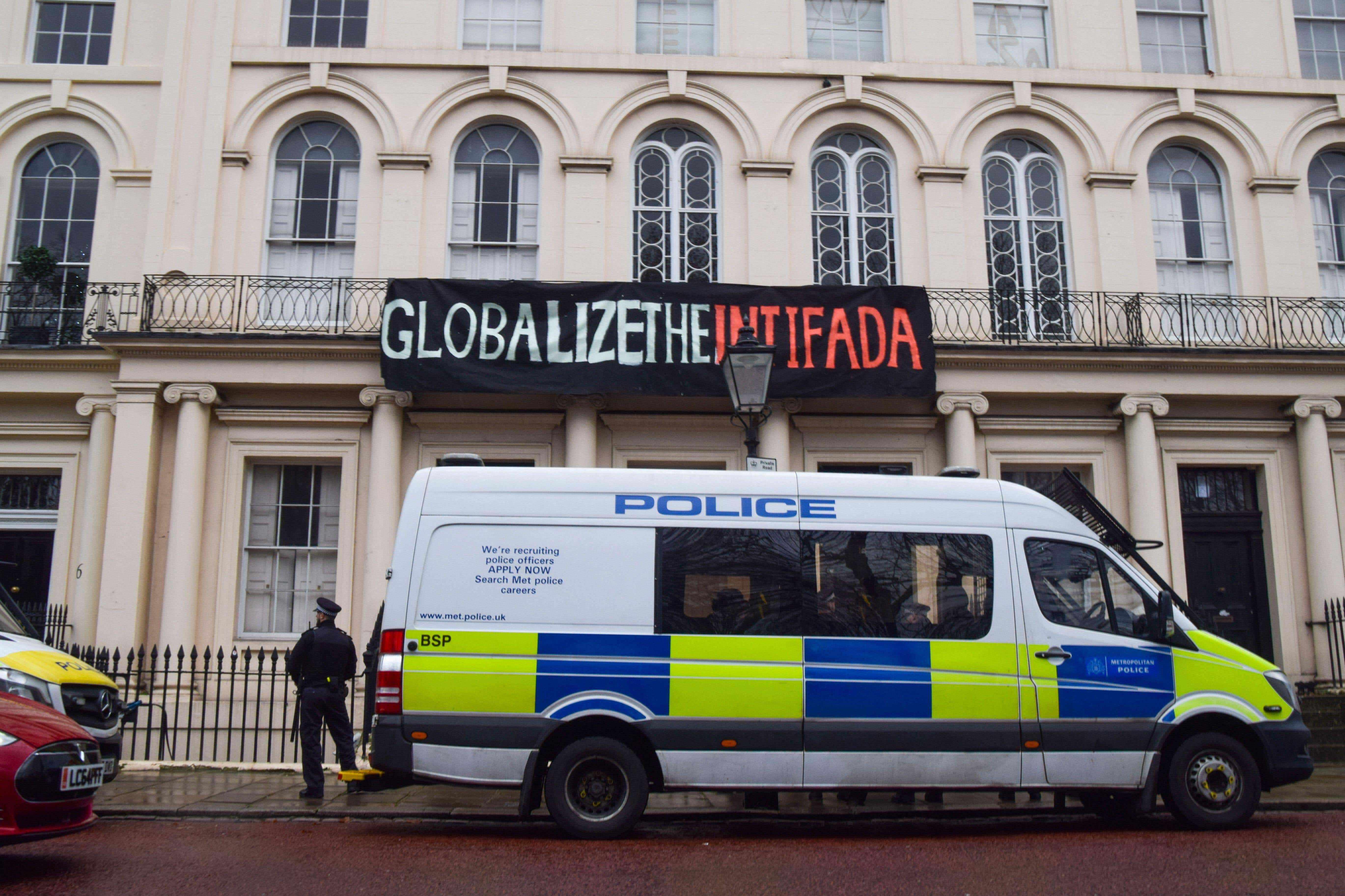 A protest banner in London in December 2023 reading Globalize the Intifada (Alamy/PA)