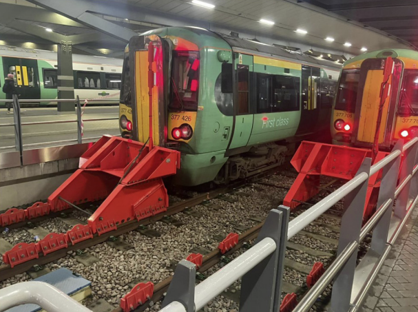 The train and buffer stops (shown on the left of the picture) after the collision at London Bridge