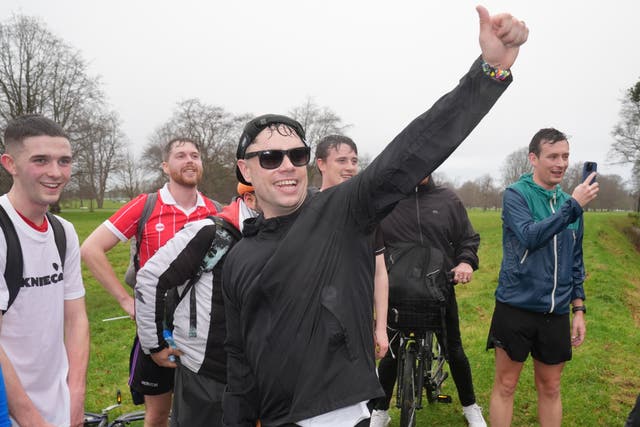 Kneecap member Naoise O Caireallain (Moglai Bap) gives a thumbs up to President Catherine Connolly in Dublin’s Phoenix Park (Brian Lawless/PA)
