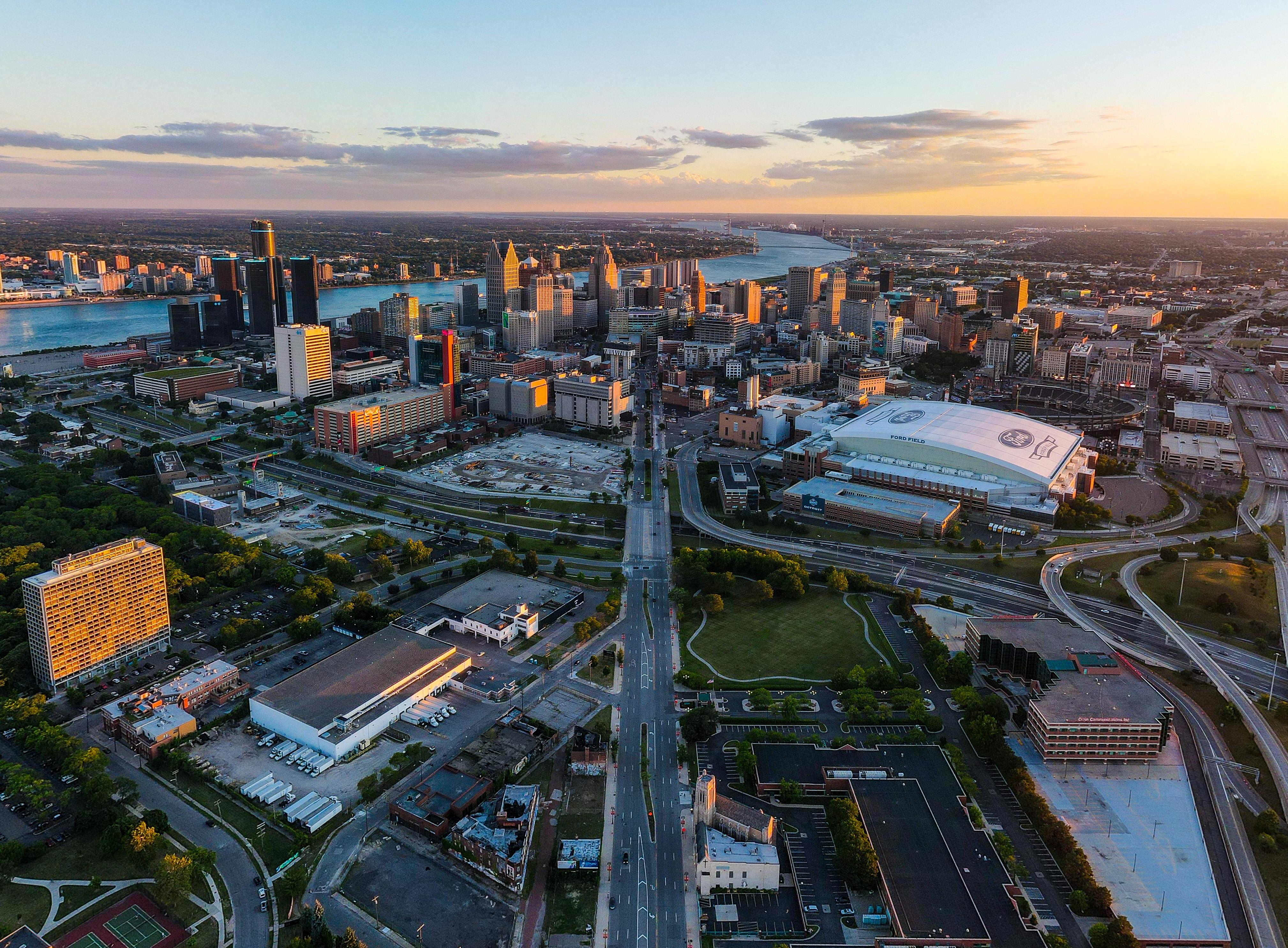 Detroit sits on the banks of Detroit River, with Windsor in Canada on the opposite side