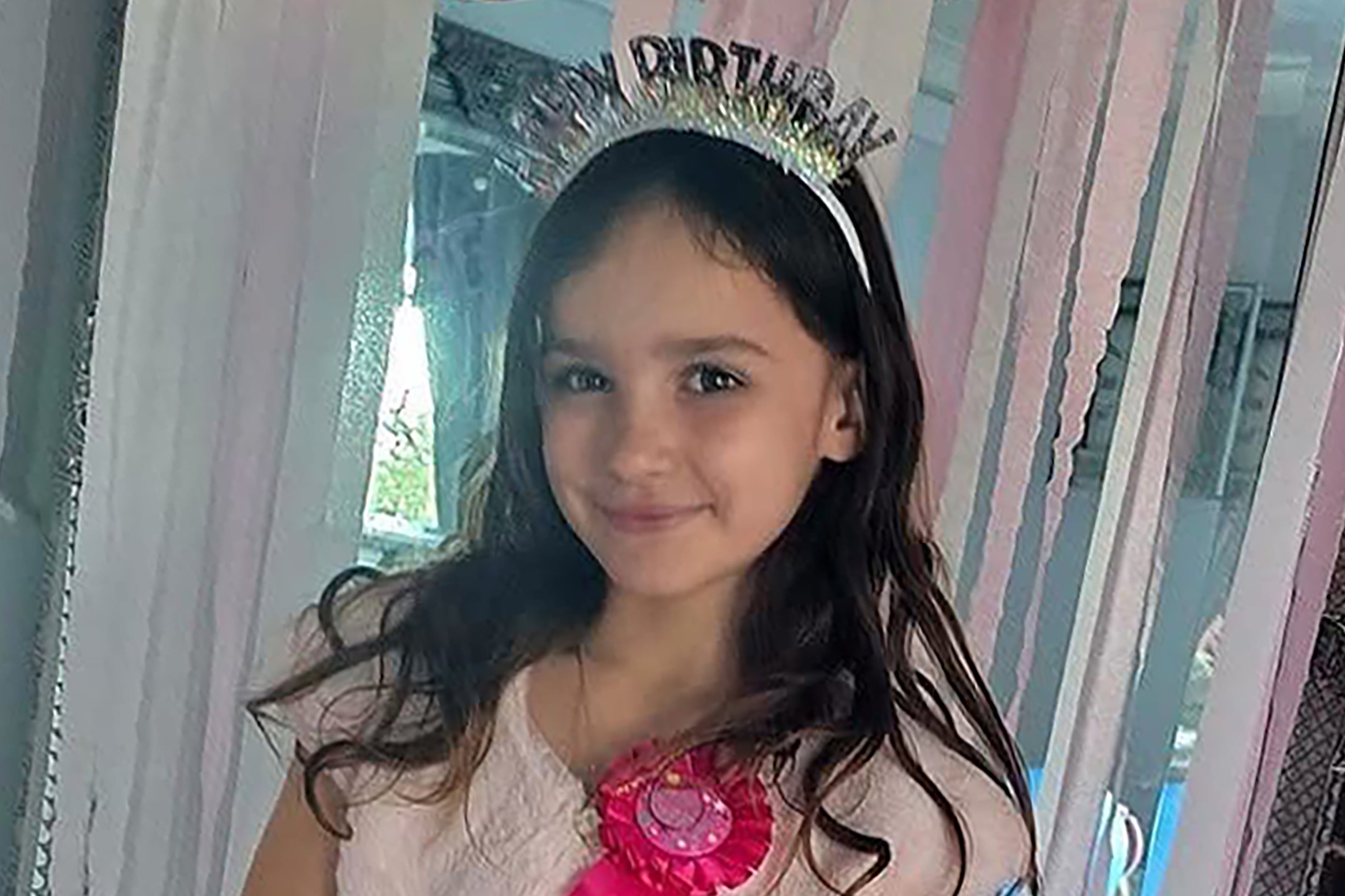 Family share pictures of lively and bubbly' young girl, 9, who died in stabbing