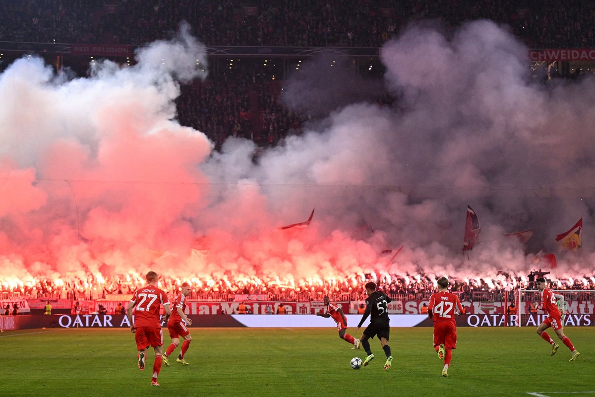 Bayern Munich hit with partial stadium closure after fireworks set off in stands Bayern Munich hit with partial stadium closure after fireworks set off in stands