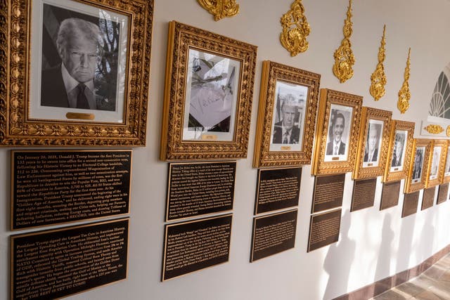 <p>New plaques have been placed underneath presidential portraits on the Colonnade at the White House, Wednesday, Dec. 17, 2025, in Washington</p>