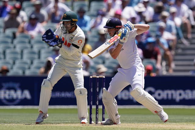 England’s Harry Brook bats while Australia’s Alex Carey watches on from behind the stumps (Robbie Stephenson/PA)