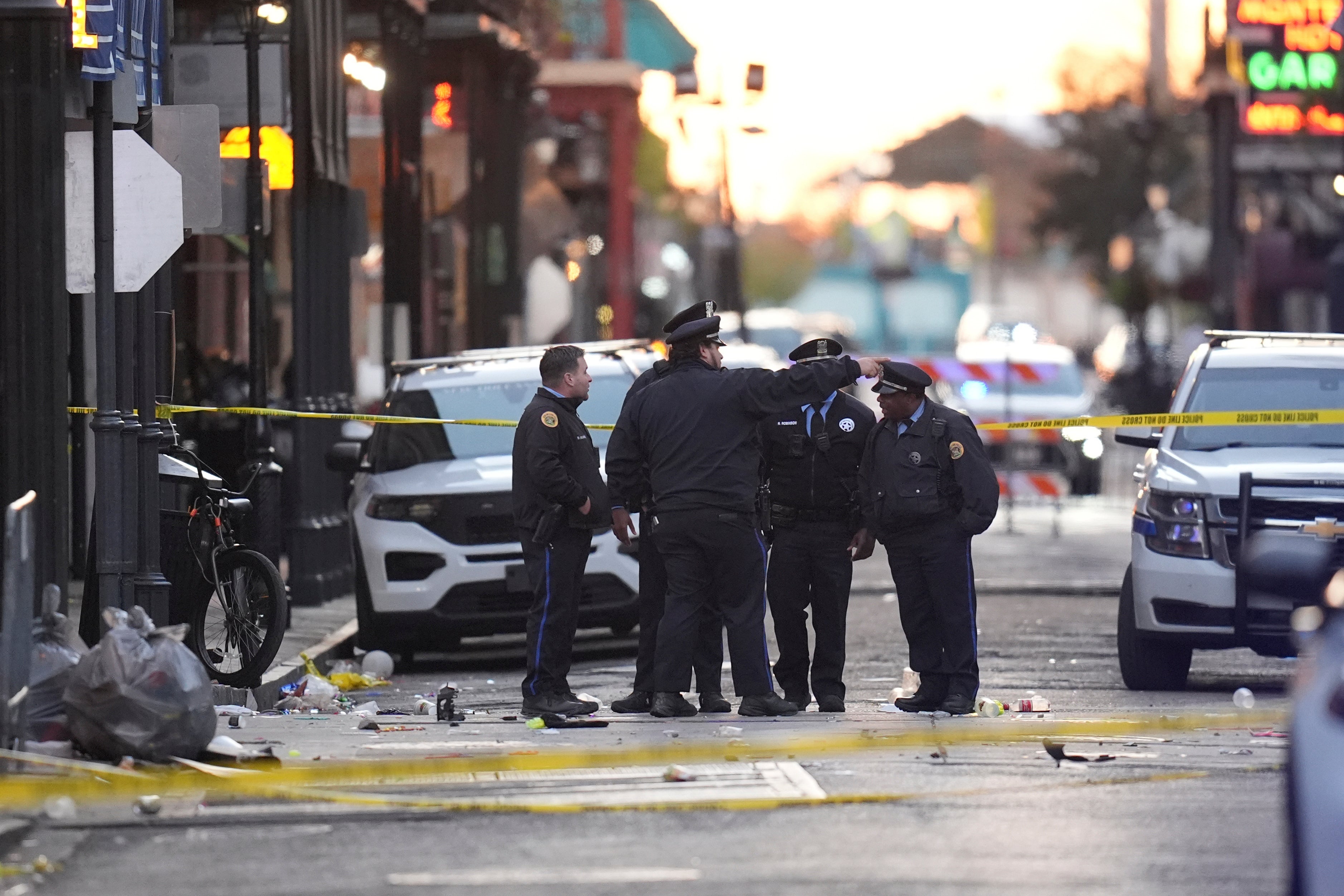 <p>FILE - Security personnel gather at the scene on Bourbon Street after a vehicle drove into a crowd in New Orleans, Jan. 1, 2025. (AP Photo/Gerald Herbert, File)</p>