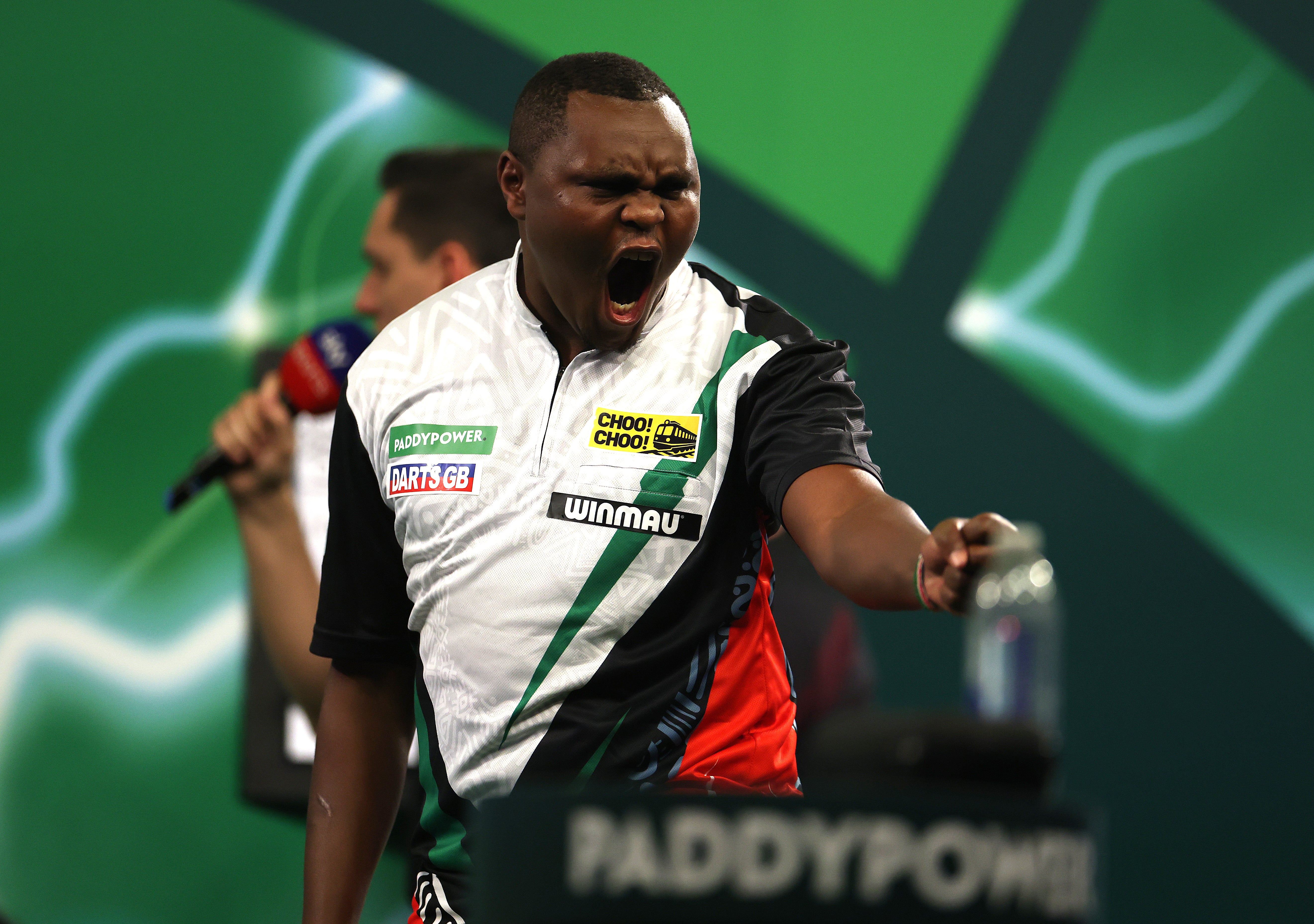 David Munyua pulled off a seismic shock at the World Darts Championship on Thursday