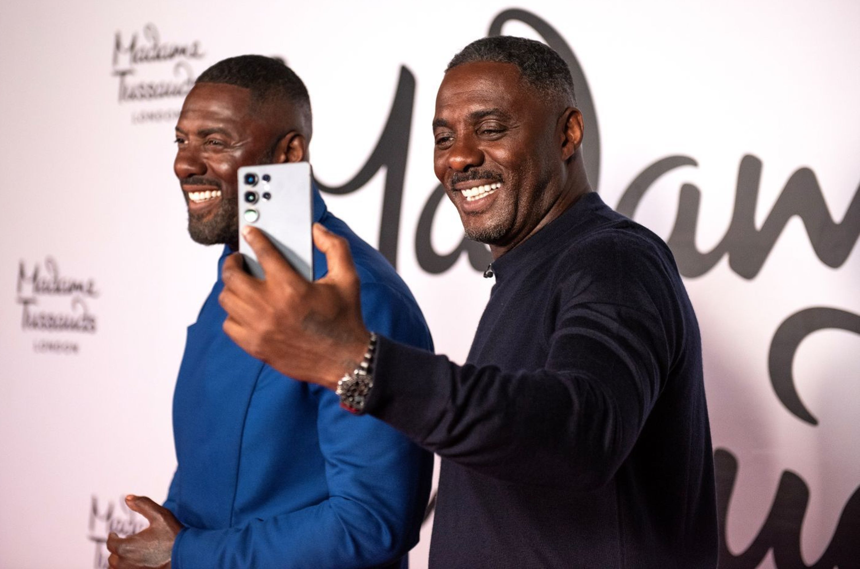 Elba poses with the new waxwork