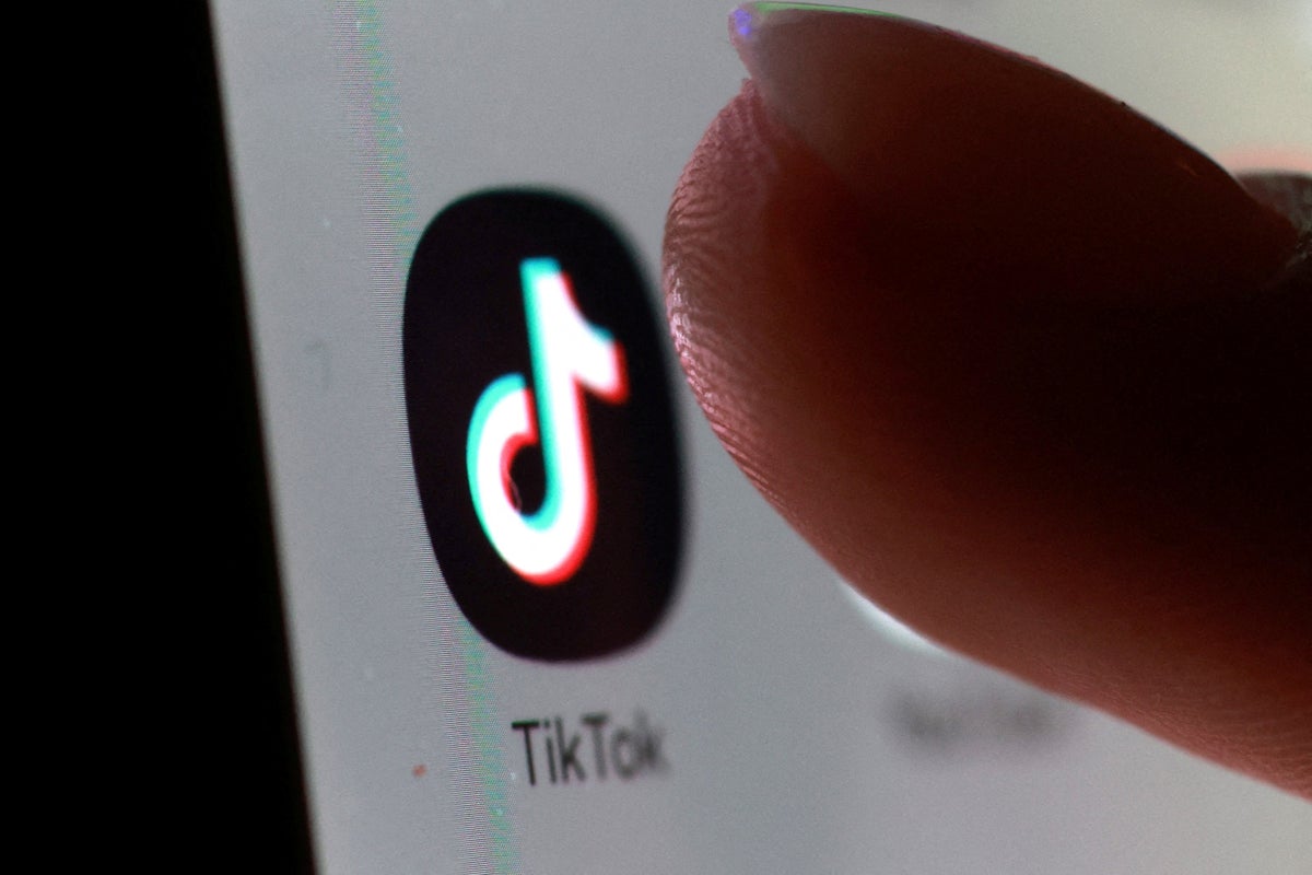 https://static.independent.co.uk/2025/12/18/22/02/FILE-PHOTO-Illustration-shows-TikTok-app-zwz501n4.jpeg?width=1200&height=800&crop=1200:800