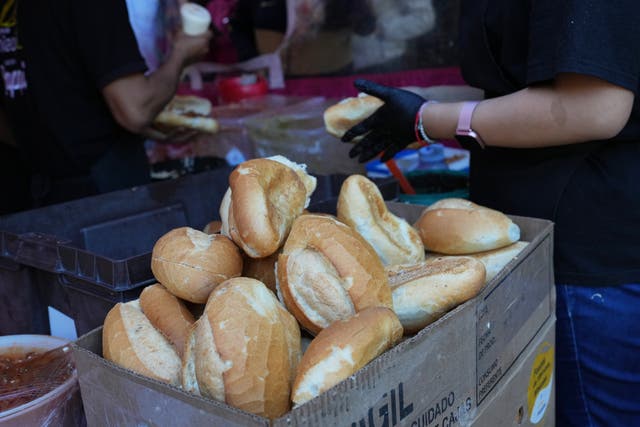<p>Bolillos, a traditional Mexican bread, sit for sale at a street stand in Mexico City</p>