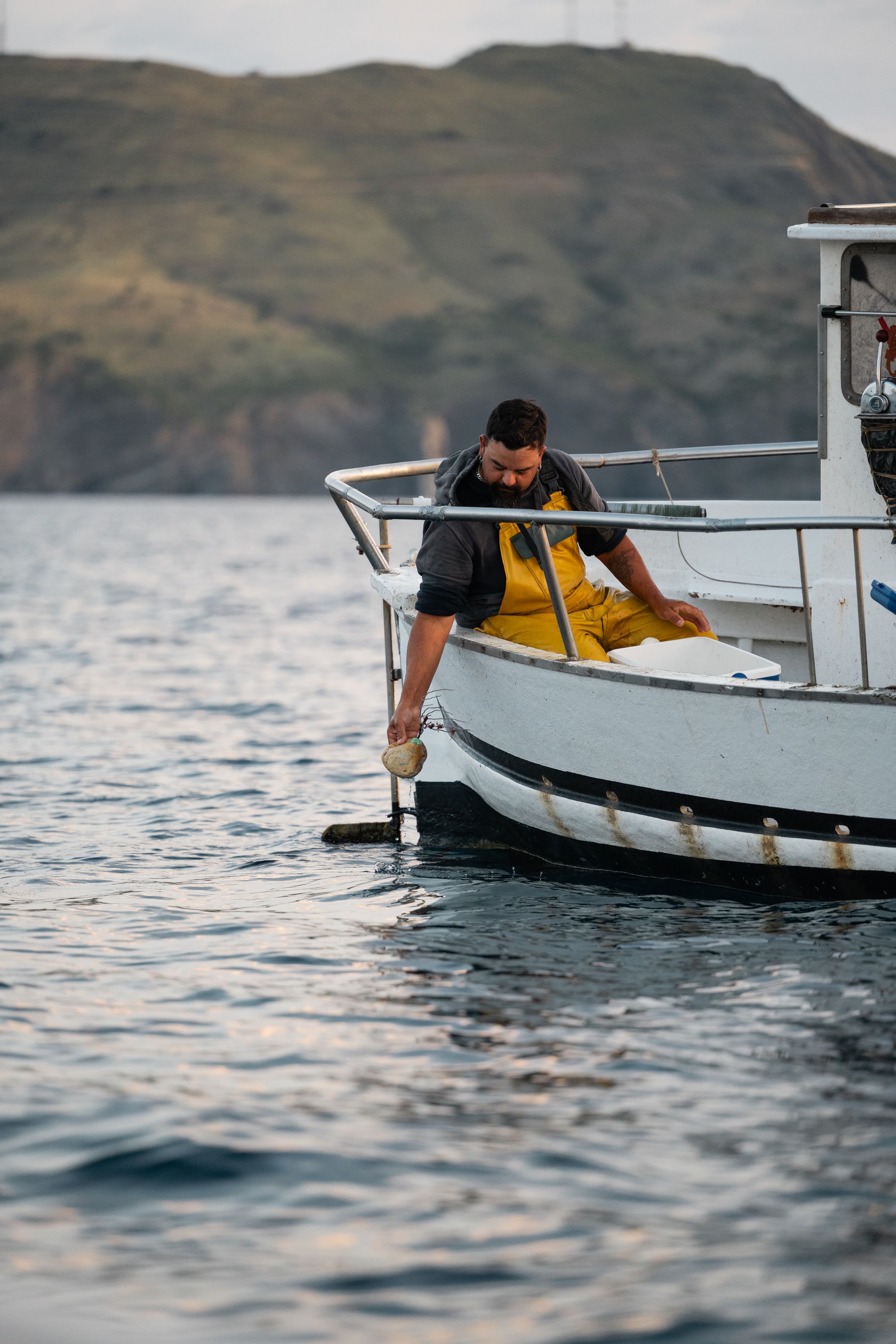 Fisherman on one of their regular missions to save the coral