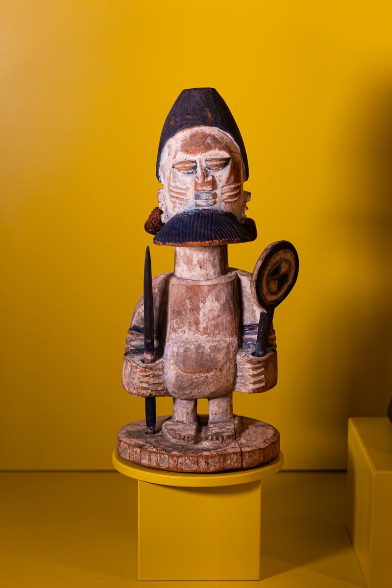 This carved wooden figure is among the displays