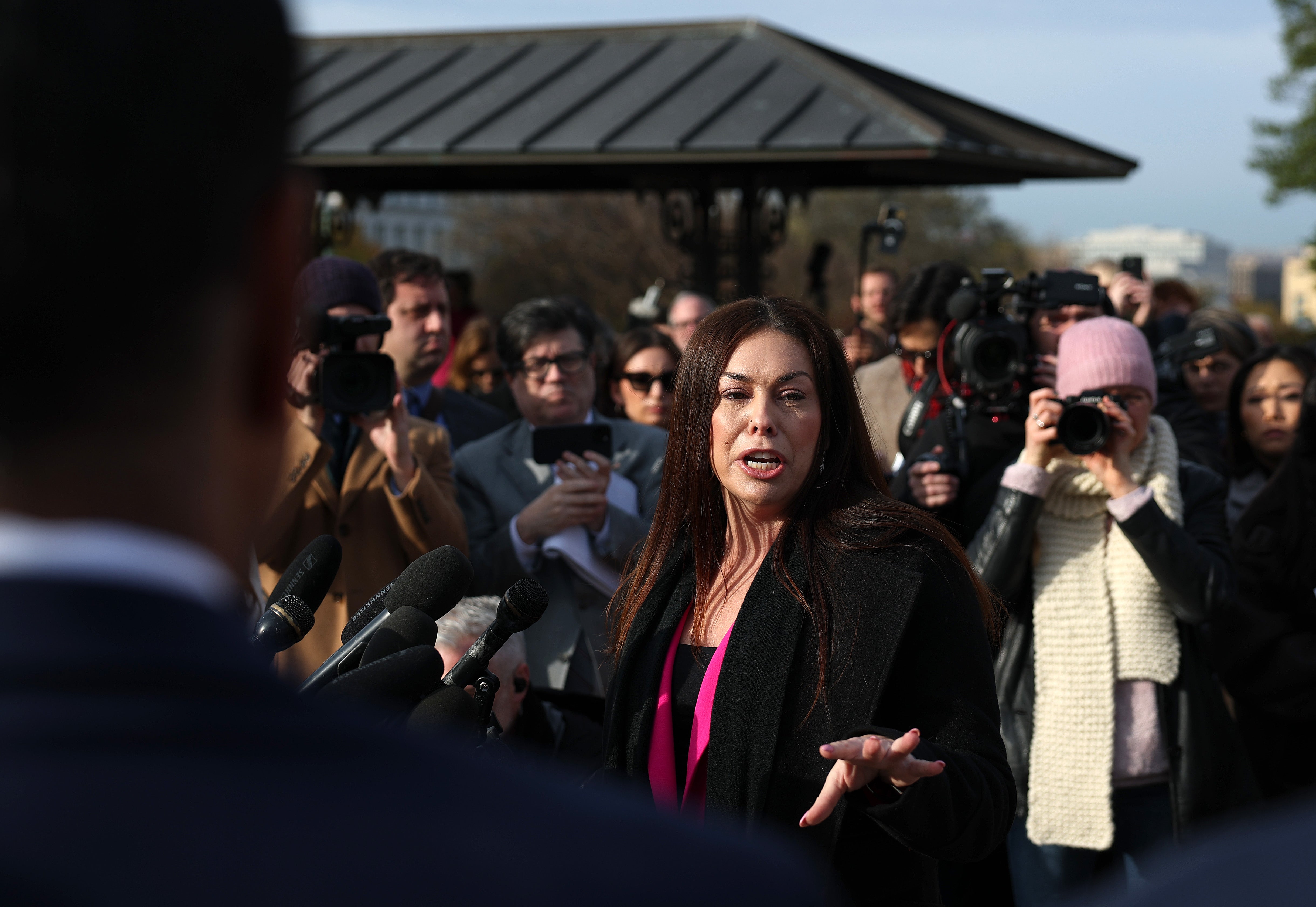 Epstein abuse survivor Haley Robson speaks during a news conference with lawmakers on the Epstein Files Transparency Act outside the U.S. Capitol