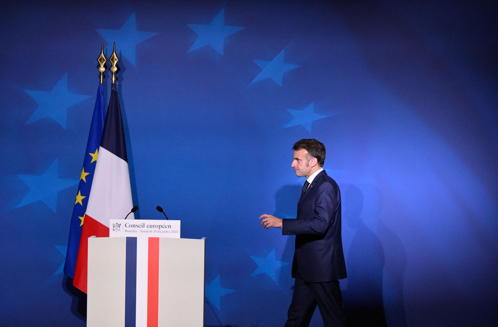 Emmanuel Macron arrives to a press conference after the European Council meeting in Brussels