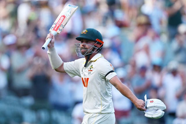 <p>Travis Head of Australia acknowledges the crowd after ending the days play on 142 not out</p>