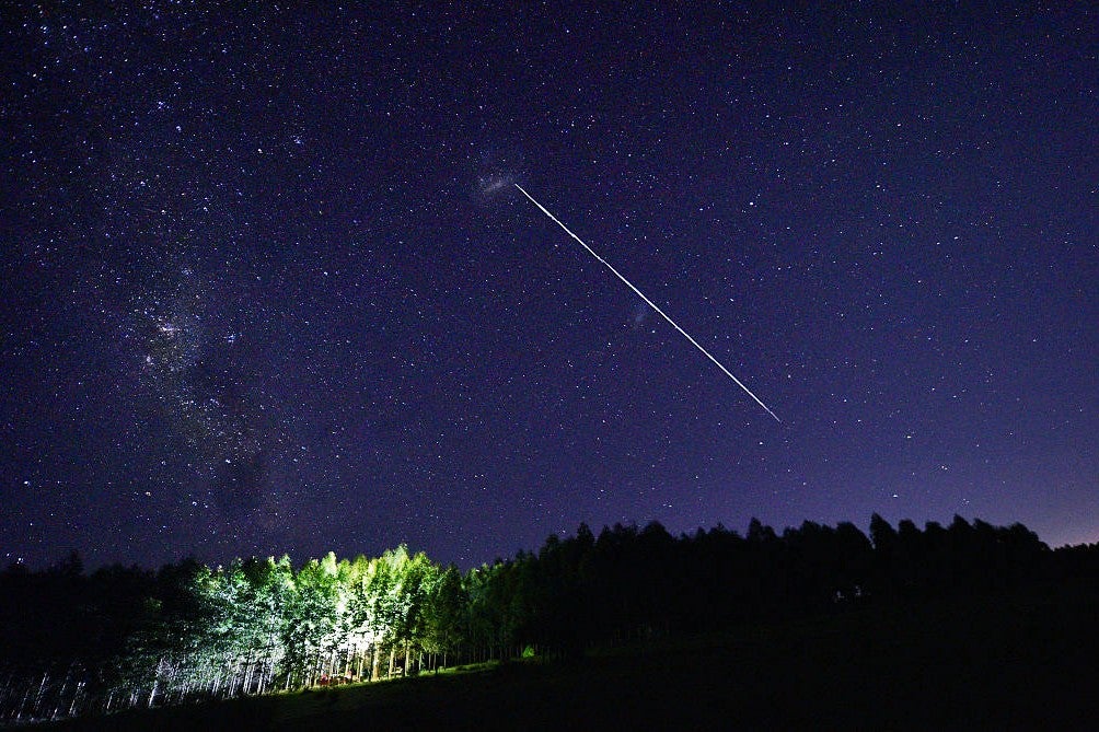 <p>A long-exposure image of SpaceX's Starlink satellites passing over Capilla del Sauce in Uruguay on 6 February, 2021</p>