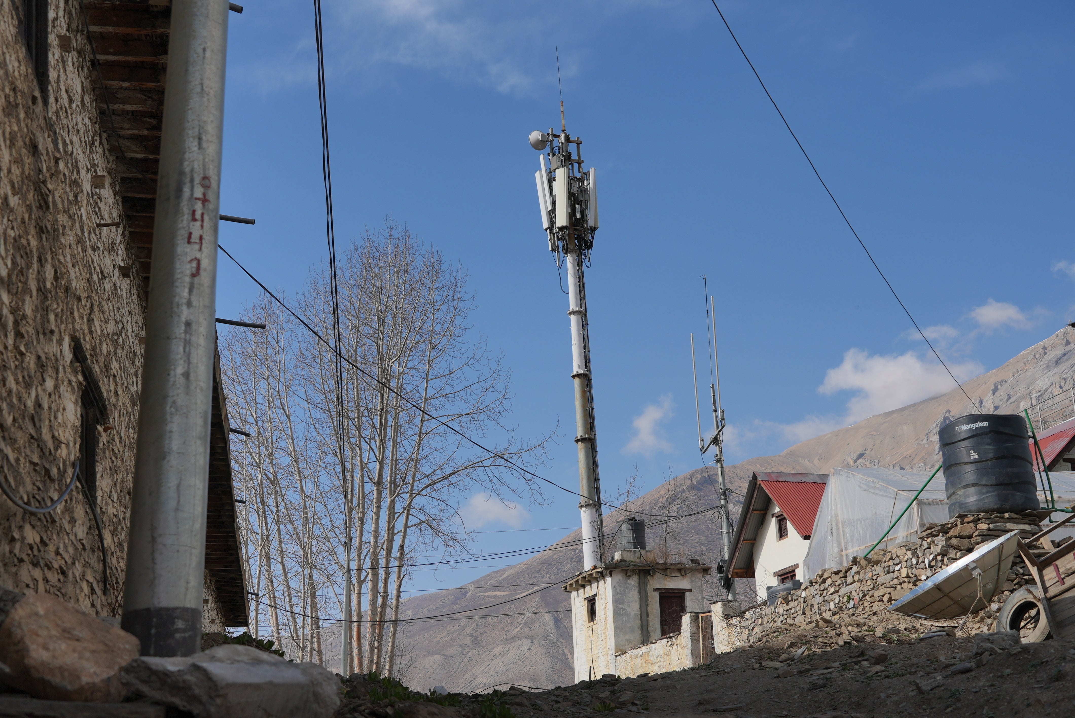 A Nepal Telecom cell tower wired with Chinese equipment stands near Sree Muktinath temple in the remote Himalayan town of Ranipauwa, Nepal